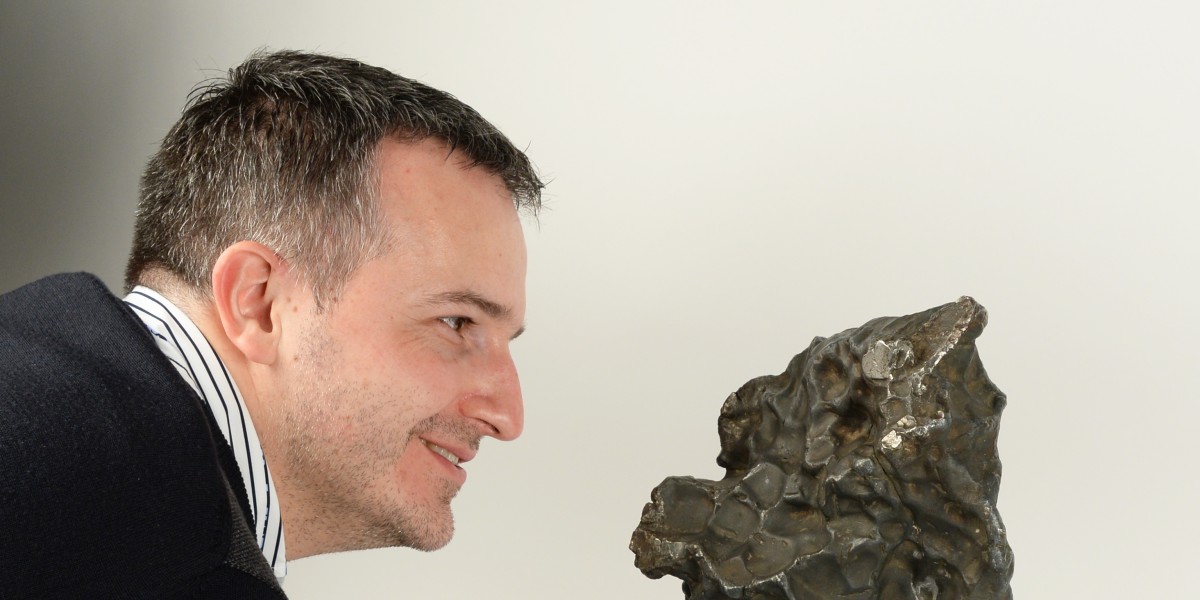 Ludovic Ferrière with the Hraschina meteorite